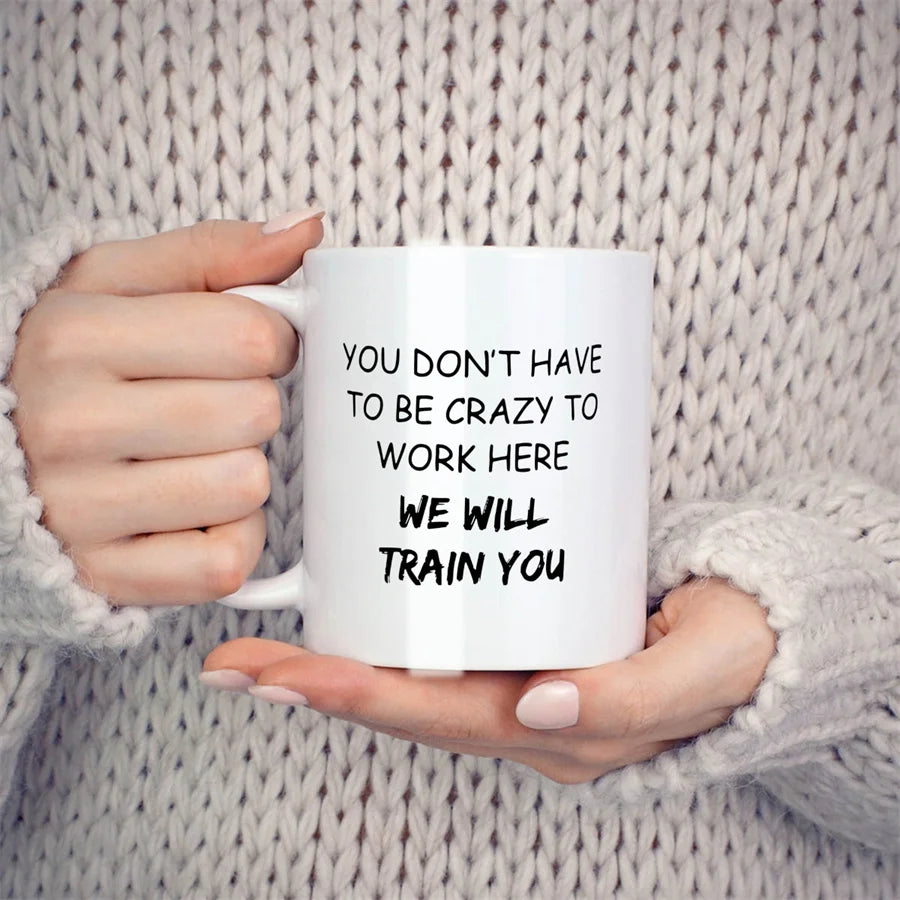 Funny Mug "You Don't Have To Be Crazy To Work Here"